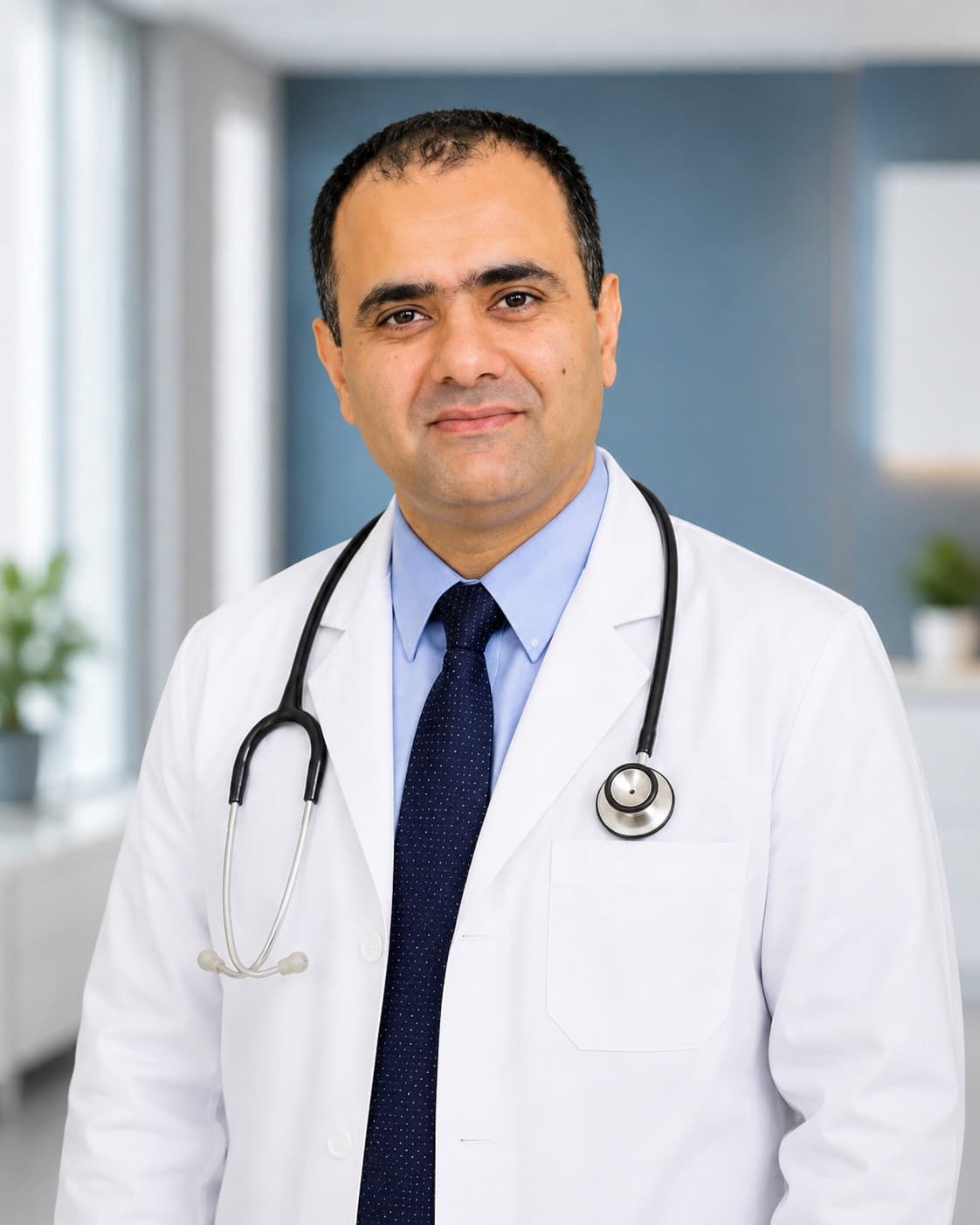 Dr. Rehan Memon, MD consulting with a patient